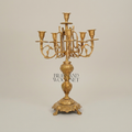 Baroque Brass 7-Arm Candelabra with Ornate Scrollwork Base — Gold