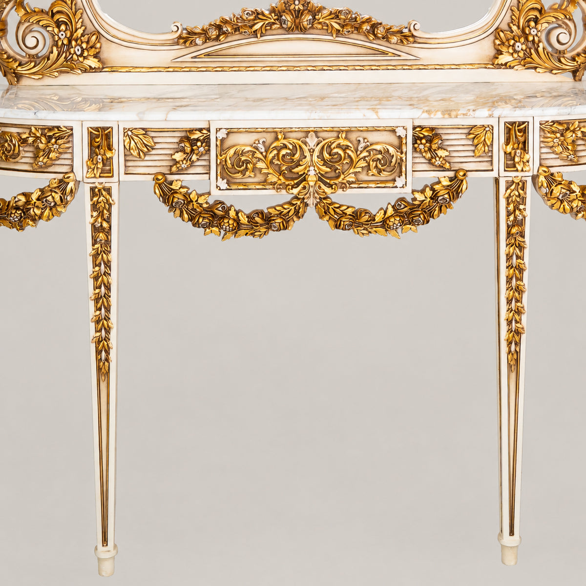 Belle Époque heavily carved gilded demi-lune console table with floral swag garlands, Carrara marble top and matching ornate console mirror View 2 | Brass & Wood
