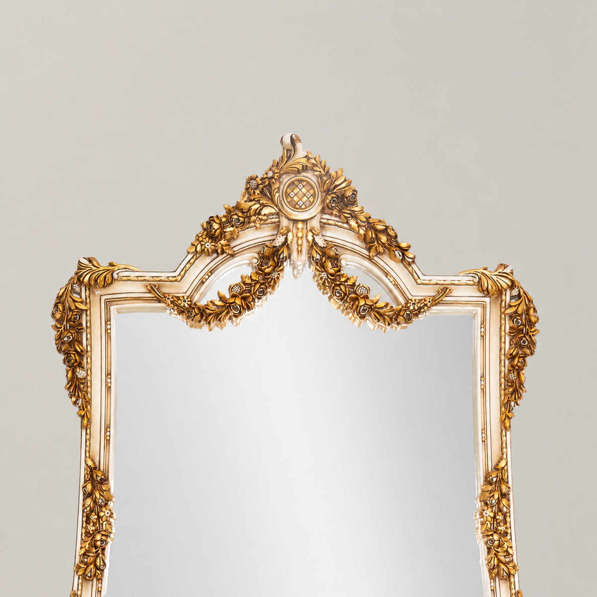 Belle Époque heavily carved gilded demi-lune console table with floral swag garlands, Carrara marble top and matching ornate console mirror View 3 | Brass & Wood