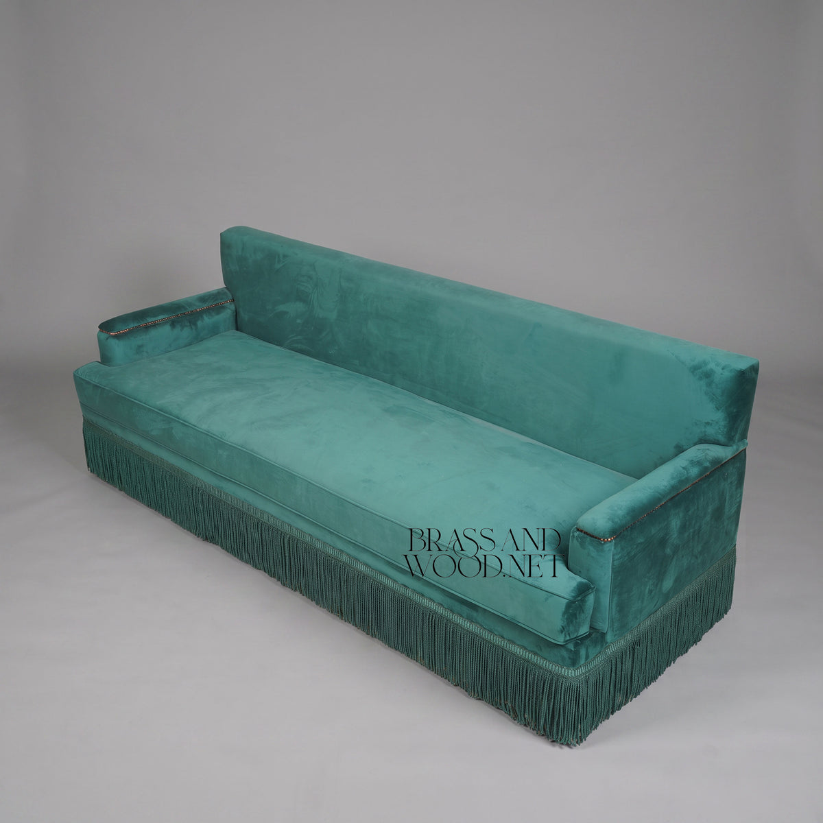 Belle Époque Teal Velvet Salon Sofa Fringe Skirt Antique Gold Nailhead Trim Elevated View | Brass & Wood