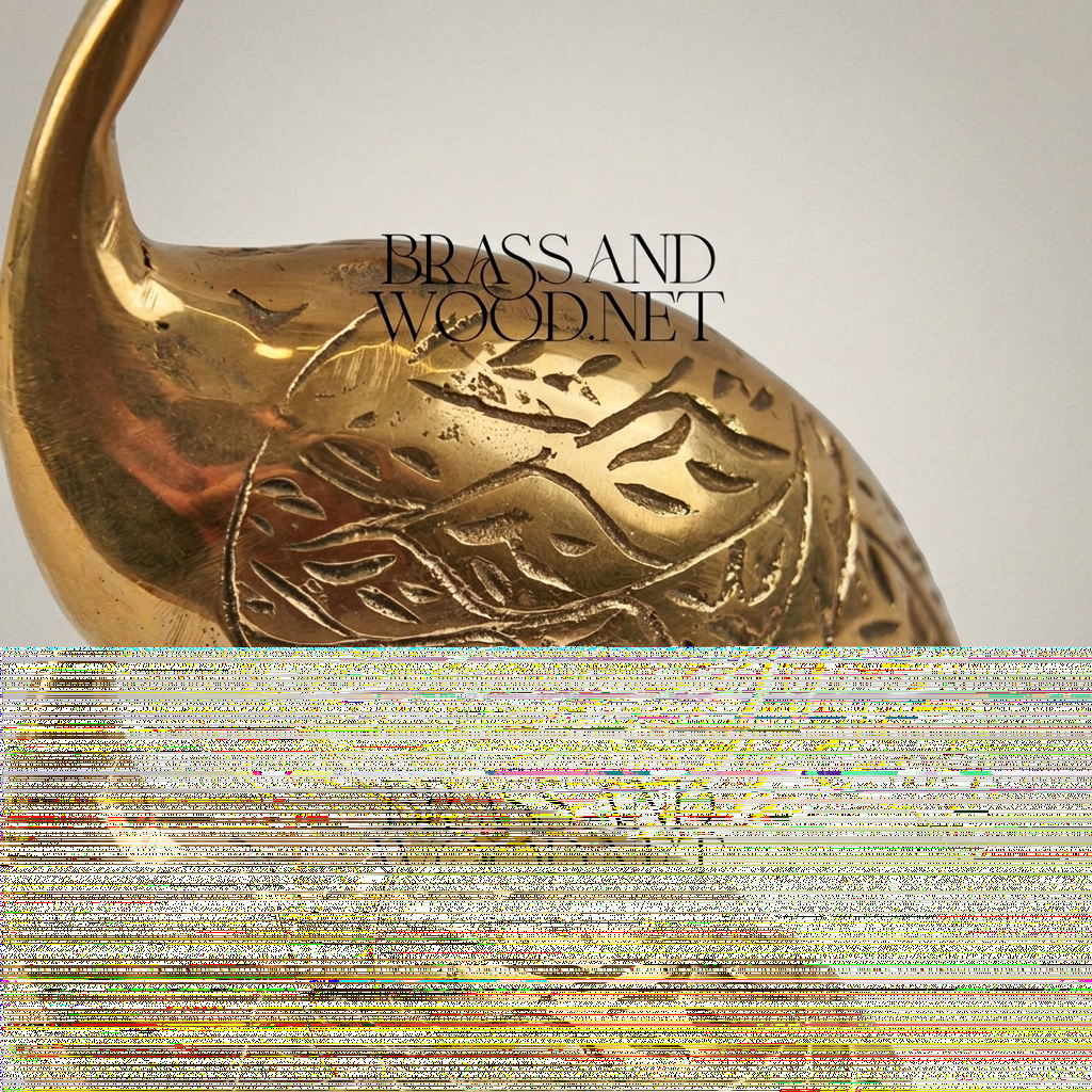 Handcrafted Brass Crane Sculpture with Engraved Foliage Body