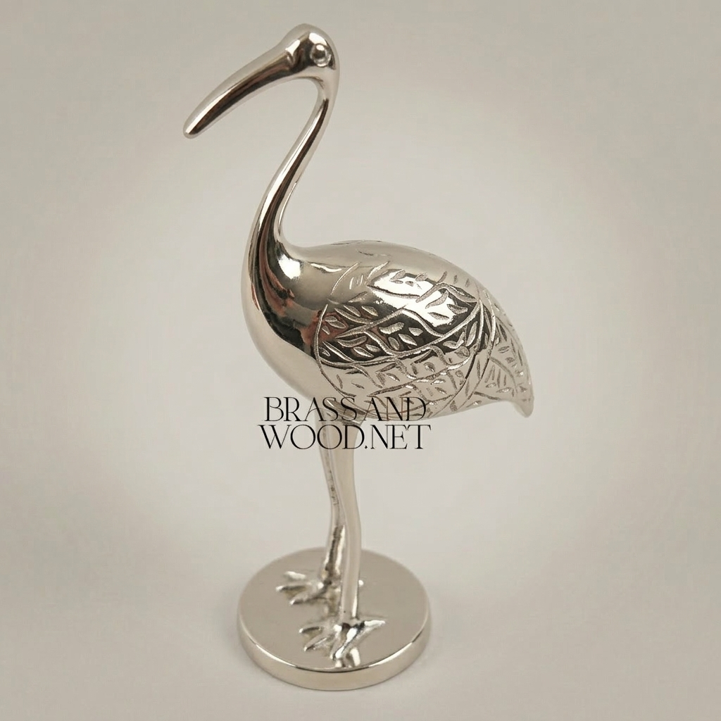 Handcrafted Brass Crane Sculpture with Engraved Foliage Body — Silver