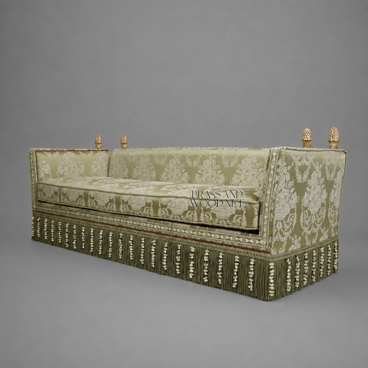 Knole Style Sage Green Damask Skirted Sofa with Antique Gold Pinecone Finials Three-Quarter View | Brass & Wood