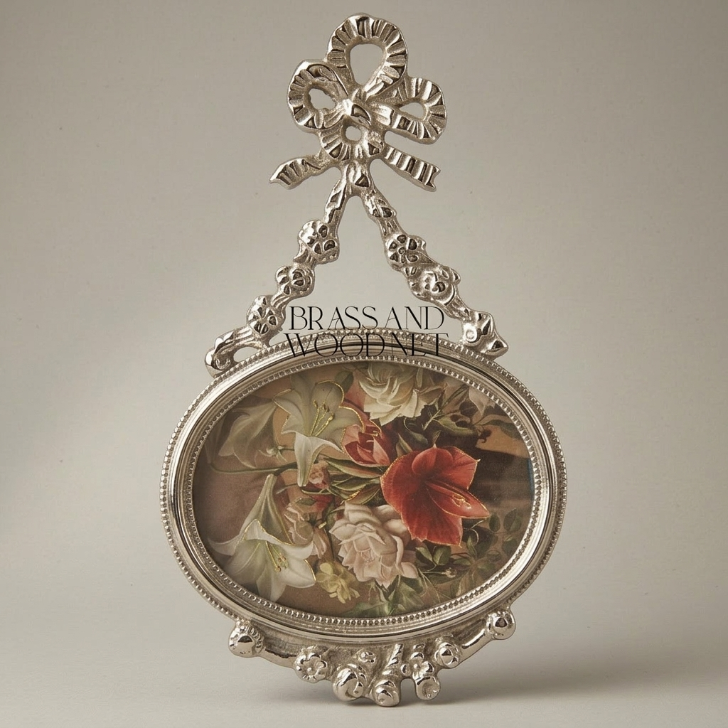 Louis XVI Oval Brass Picture Frame with Bow & Floral Garland Crest — Silver