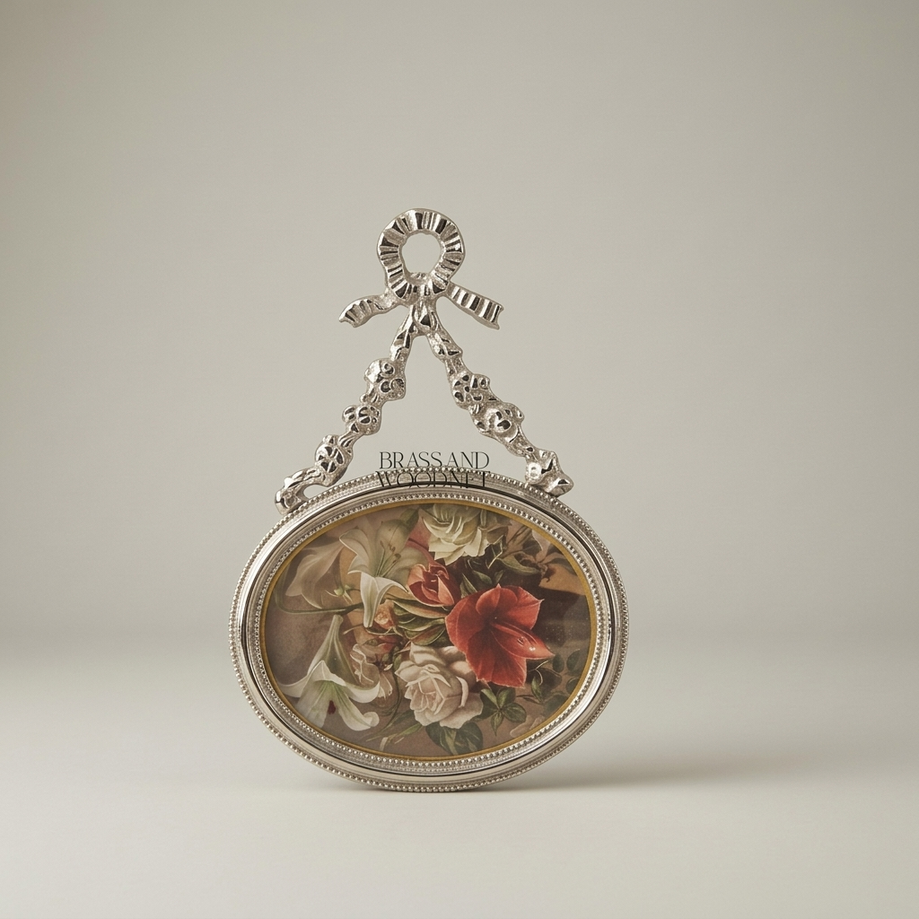 Louis XVI Oval Brass Picture Frame with Bow & Floral Garland Crest — Silver