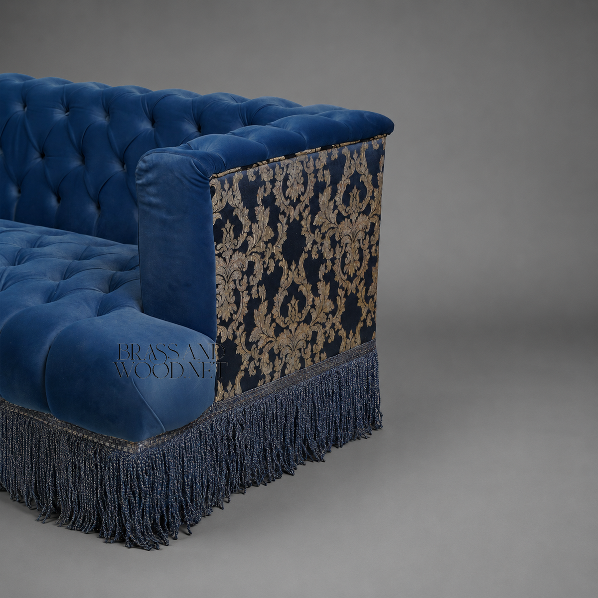 Napoleon III Capitonné Navy Blue Velvet Sofa with Damask Panels and Twisted Bullion Fringe Skirt Detail View | Brass & Wood