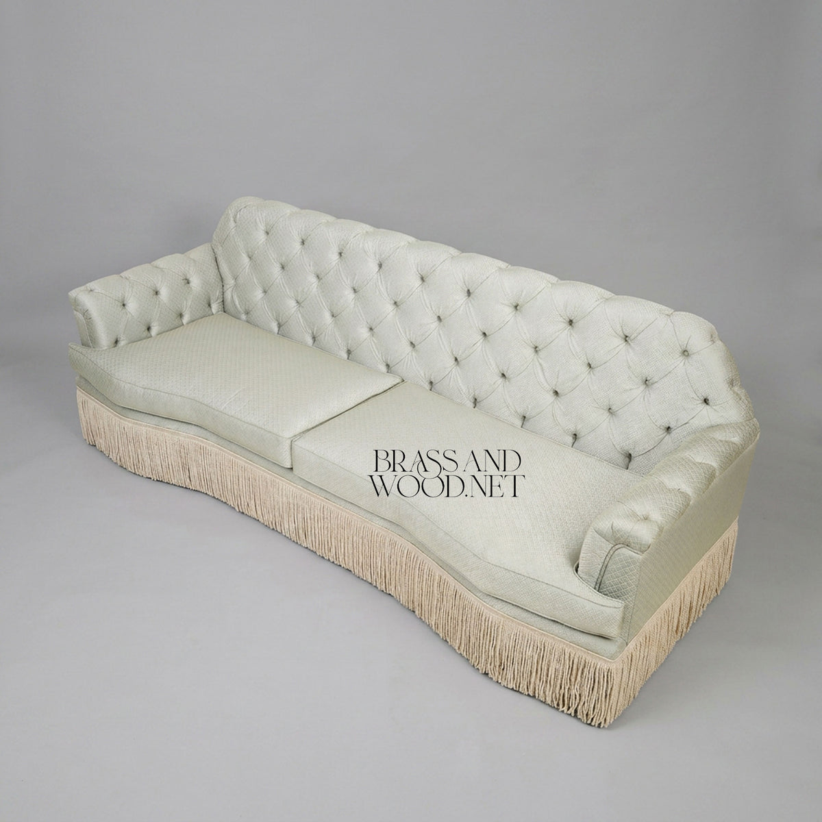 Napoleon III Capitonné Salon Sofa Button Tufted Back Floor-Length Fringe Valance Pale Mint Elevated View | Brass & Wood