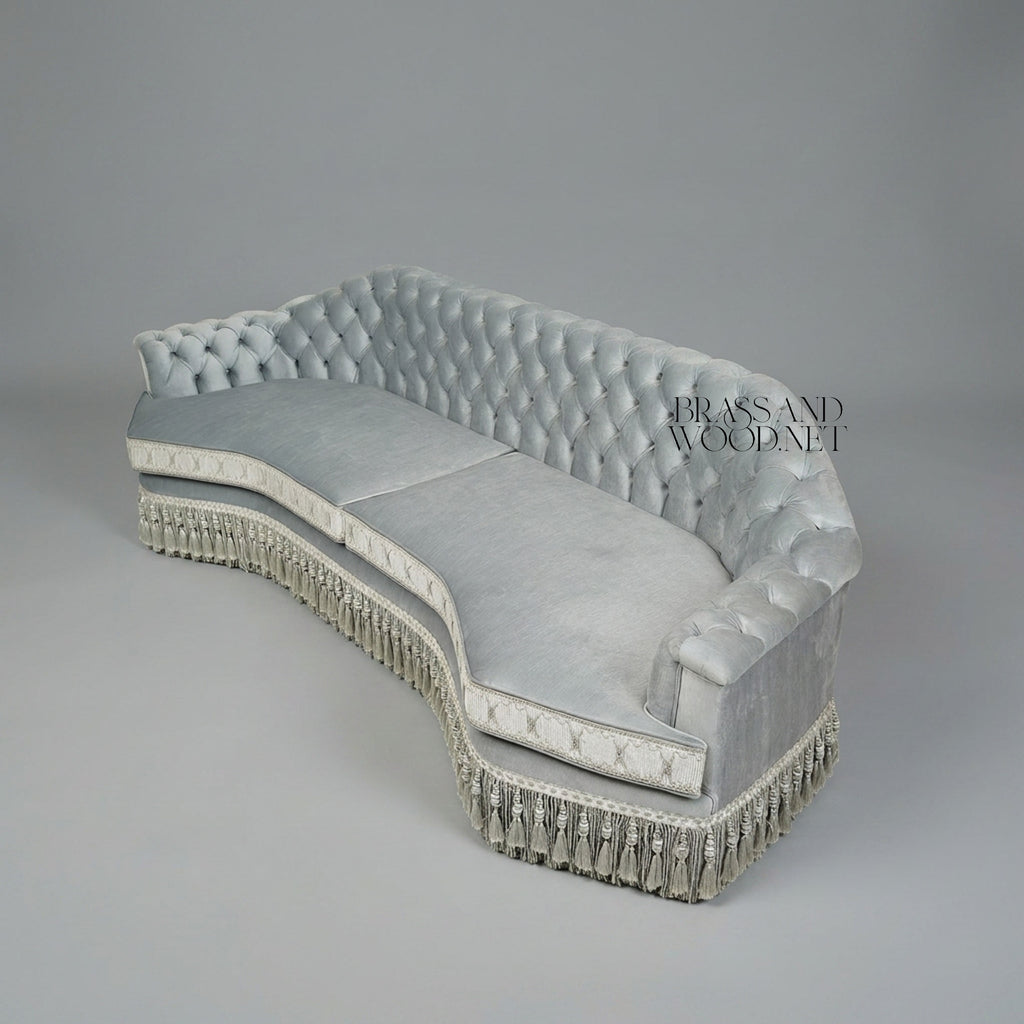Napoleon III Curved Capitonné Canapé Sofa Silver Velvet Diamond Tufted Tassel Fringe Skirt Three-Quarter View | Brass & Wood