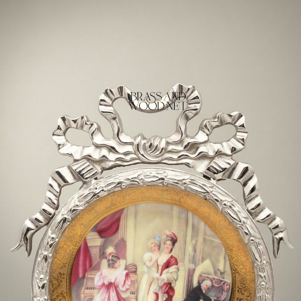 Neoclassical Bow-Crowned Circular Brass Frame with Hand-Painted Salon Scene Porcelain Plate — Silver