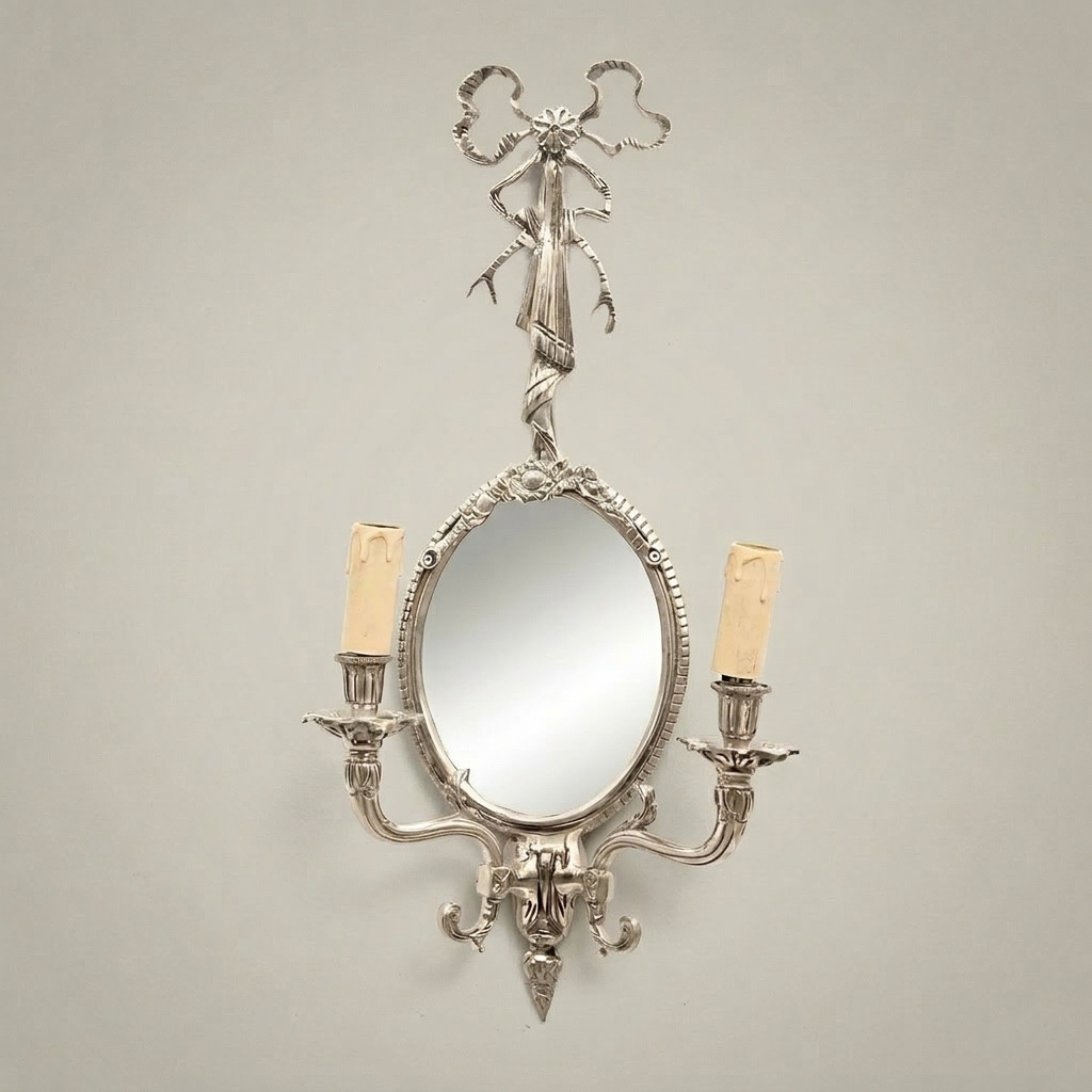 Neoclassical Brass Wall Sconce Mirror with Bow Crest & Twin Candle Arms — Silver