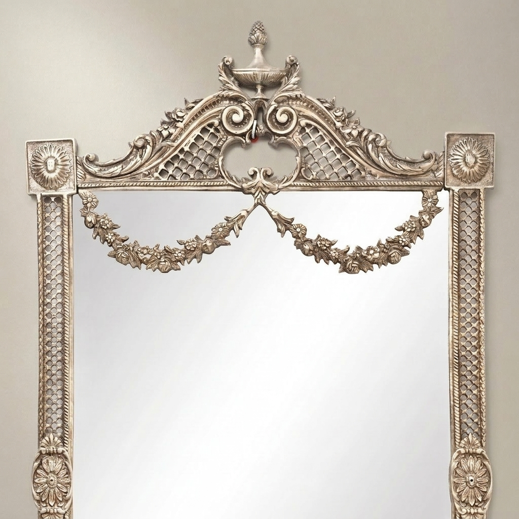 Neoclassical Hand-Carved Wall Mirror with Floral Swag Pediment & Reticulated Frame — Silver