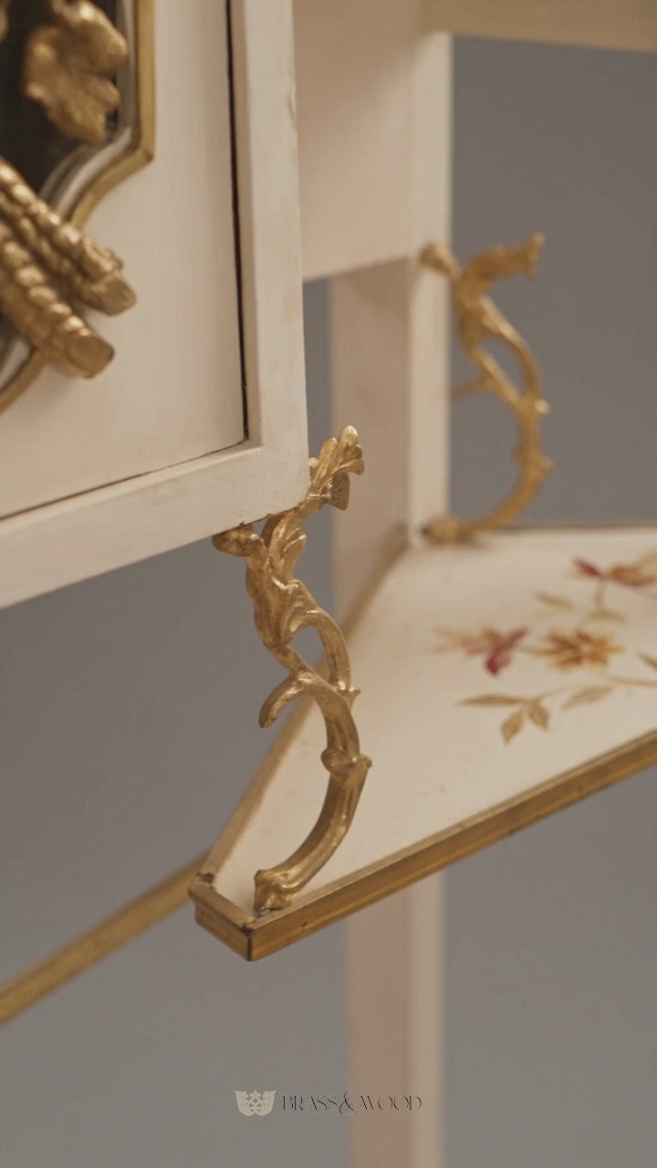 Belle Époque Ivory Painted Vitrine Cabinet with Hand-Painted Florals & Gilt Brass Mounts - Brass & Wood product video