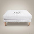 Neoclassical Salon Ottoman with Turned Legs & Nailhead Trim